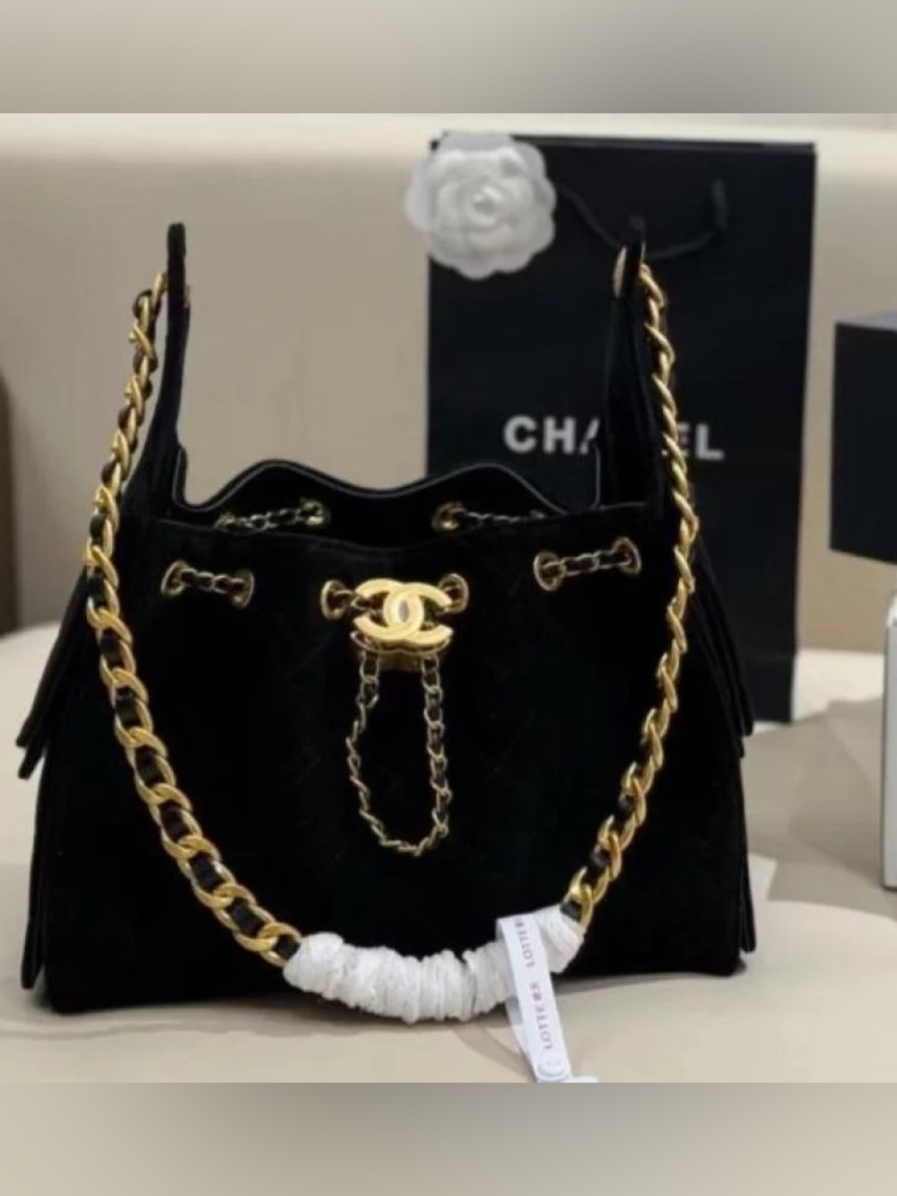 CHANEL Black Suede Drawstring Bucket Bag with Gold Chain